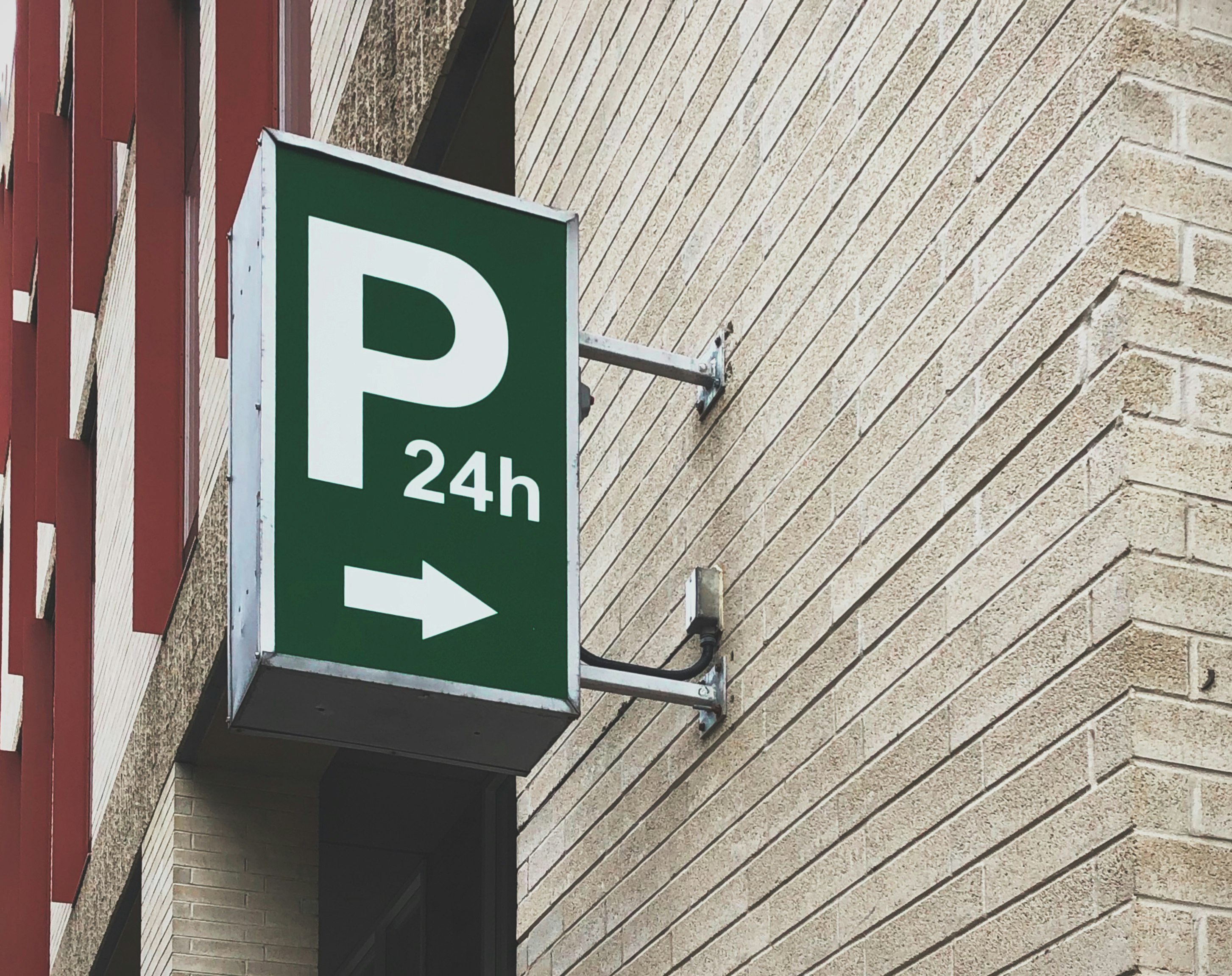 white and green P24h signage